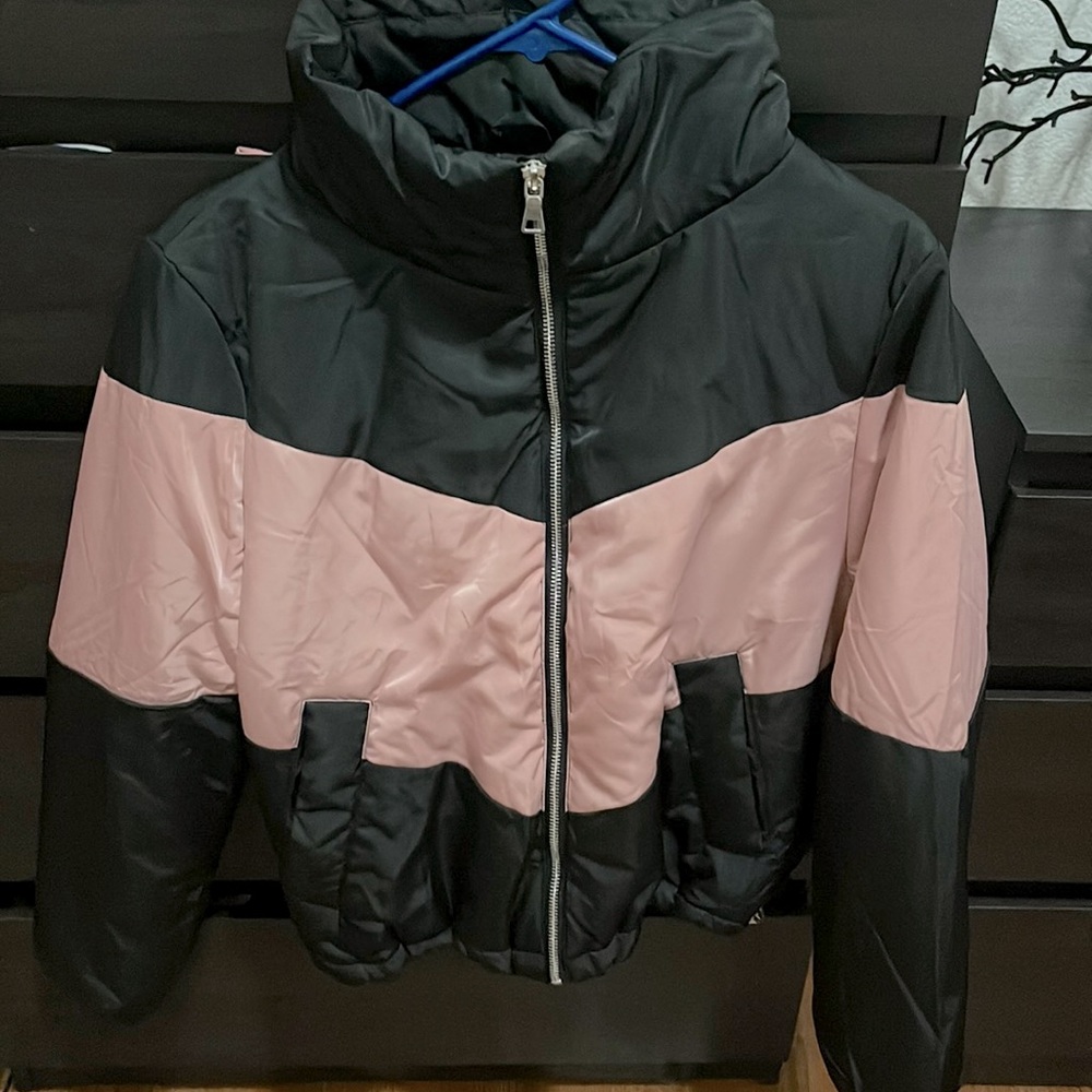 Black with pink stripe puff jacket.